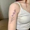 Tatuagem Adesiva Minimalista de Buquê de Fita Pastel Padrão de Lírio-do-Vale Desenhado à Mão Clavícula Atmosfera Tatuagem à Prova d'Água