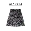 Nueva Falda de Cadera Media Lana Negra Estilo Chanel Falda Cintura Alta Adelgazante Moda Commuter Versátil Falda Media Longitud