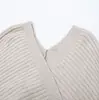 Atacado de roupas femininas estilo europeu e americano Ins, nicho, conjunto de tricô com gola cruzada e calça de tricô de cintura alta com amarração na cintura