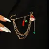 Broche de cadena nuevo transfronterizo para hombres y mujeres estilo frío mariposa amor cruz pin punk hip hop pin de hebilla para traje