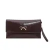 Bolso de Hombro/Mano para Mujer 2026 PU Color Sólido con Lazo Estilo Coreano Diseño de Moda Tendencia Color Sólido Sobre Bolso de Mano