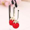 Pendientes de lazo de terciopelo rojo con ambiente de moda, temperamento femenino, flor dulce, borla larga, pendientes Joker al por mayor