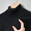 Comercio exterior transfronterizo al por mayor suéter de cuello alto para hombre otoño e invierno engrosado cálido color liso casual punto base para mediana edad