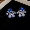 Colección de Pendientes de Circonita Estilo Coreano Hada Mariposa Estrella Sensación de Hielo Triturado Pendientes de Botón Serie Azul Joyería de Oreja Simple Venta al por Mayor