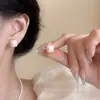 2026 Aretes de Perlas Estilo Nuevo Aguja de Plata S925 Lujo Ligero Aretes de Gama Alta Diseño de Nicho Versátiles Elegantes Aretes para Mujer