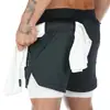 Venda direta da fábrica shorts esportivos de marca moderna de camada dupla, transpiráveis e de secagem rápida para homens, shorts esportivos de verão de comprimento 3/4 de secagem rápida para fitness