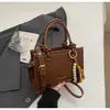 Bolsas Pequeñas Súper Populares para Mujer Primavera y Verano 2025 Nuevo Bolso Cruzado Versátil de Moda Bolso de Mano Bolso Cubo Bolso Tote Pequeño