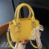 Bolso Cruzado de Concha para Mujer Bolso Cubo Estilo Nuevo 2025 Patrón Granulado Gran Capacidad Cruzado Moda Portátil Bolsa para Clase y Viajes