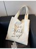 Bolsa de Lona Transfronteriza Estilo Coreano Bolsa Estilo Perezoso para Mujer Gran Capacidad 2026 Nueva Bolsa de Hombro Casual de Primavera y Verano Bolsa Tote