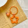 Chaveiro Pingente Acrílico Estrela de Cinco Pontas Fone de Ouvido Dopamina Enfeites Pendurados Decoração de Bolsa Pequena Fresca com Sino
