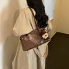 Bolsa de Ombro Feminina Couro Oleado com Cera Outono/Inverno 2026 Novo Estilo Moda Versátil Grande Capacidade Casual Super Quente Estilosa Bolsa Grande de Ombro Único