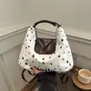 Bolsa de Mujer Linda de Dibujos Animados 2025 Nuevo Otoño e Invierno Retro Gran Capacidad Hombro Viajero Lunares Moderna Bolso Tote Versátil