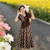 Conjunto de verano para niñas estilo coreano, nueva falda de cuadros con lazo, top de manga corta, falda larga, conjunto de dos piezas para niños mayores