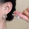 Pendientes de botón Retro Franceses de Rosa y Mariposa para Mujer Simples Elegantes de Gama Alta Dulces de Diseño de Nicho Modernos