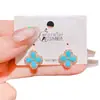 Pendientes de Flor de Cuatro Hojas de Zirconia Turquesa Imitación Retro de Aguja Plateada de Lujo Ligero de Gama Alta Pendientes Clásicos Retro Estilo Chino Nuevo
