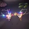 Nueva Diadema de Cuernos Luminosos Transfronteriza Nueva Diadema Navideña Ciervo Baya Orejas de Gato Headwear Mayoreo