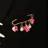 Broche Colgante de Mariposa Rosa Corazón de Melocotón Cinta Hermana Cuidado de Senos Europeo y Americano Transfronterizo Broche de Perla Blanca