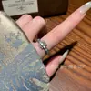 Anillo de hebilla de herradura de jade azul natural al por mayor del fabricante Xiaohongshu con incrustación de plata s925, diseño fresco y simple