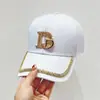 Nuevo estilo coreano simple letra de diamantes de imitación D cara-mirando pequeño sol protección gorra de béisbol diseño al por mayor gorra con visera