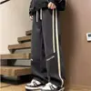 Pantalones casuales para hombre, pantalones deportivos holgados de moda de primavera y otoño, pantalones rectos cálidos con forro polar para otoño e invierno, pantalones deportivos de dos usos para hombre.