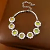 Pulsera de flor redonda de oro rosa real, pulsera de nicho de lujo ligero, estilo de corte de alta gama, joyería versátil y elegante al por mayor