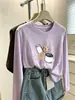 Diseño único, camiseta de algodón de manga larga con cuello redondo y estampado de copos de nieve para mujer, un estilo ligero de otoño que se puede usar como capa exterior, ofreciendo un look casual, juvenil y a la moda.