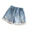 Jeans de Verano para Niñas Nuevo Estilo Coreano de Moda Pantalones Cortos con Bordado de Encaje y Corazón Dulces Versátiles Pantalones Calientes para Niñas
