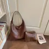 Bolsa pequena retrô para mulheres, nova moda de verão 2026, alto valor estético, bolsa tipo balde simples e estilosa, bolsa de ombro de grande capacidade