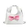Bolso Infantil Transfronterizo 2026 Nuevo Modelo Dulce Nicho Lazo Media Luna Bolso de Mano para Niñas Elegante Bolso Cruzado con Cadena