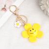 Llavero de flor grande japonés y coreano con girasol acrílico y colgante de bolso sonriente.