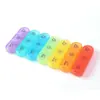 Organizador de pastillas portátil de 21 compartimentos de colores del arcoíris para siete días a la semana, caja de pastillas compartimentada de plástico para Amazon transfronterizo