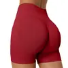 Shorts de yoga seamless de cintura alta cruzada Lycra levantamiento de glúteos realce de cadera pantalones de yoga para exteriores fitness deportivos para mujer 5112