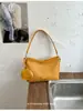 Design de Nicho Moda Casual Textura de Bolsa Bolinho Simples Nova Bolsa 2026 Primavera Bolsa Transversal de Ombro Único Feminina
