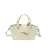 Bolso de cubo de mano de nicho estilo coreano para mujer, nuevo modelo 2026, bolso tote de alta gama para el día a día, elegante bolso de hombro y cruzado