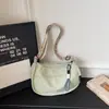 Bolsa de ombro feminina leve estilo coreano, adequada para escola e trabalho, nova coleção de verão 2026, grande capacidade, bolsa de bolinho casual e moderna