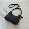 Bolso vintage de gran capacidad transfronterizo para mujer, nuevo bolso cruzado casual versátil de otoño 2026, bolso de hombro de lona para debajo del brazo