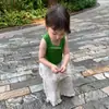 Conjunto de Dos Piezas para Niñas Estilo Coreano Verano 2026 Nuevo Chaleco Delgado de Algodón Verde Ajustado y Pantalones de Pierna Ancha de Encaje Color Albaricoque Bebé