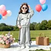 Conjunto de Duas Peças com Laço para Meninas no Início do Outono Estilo Coreano Doce Conjunto Casual para Bebês Calças Largas Soltas para Crianças