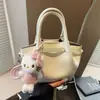 Bolso de mano grande de estilo vintage simple, nuevo para la primavera 2026, transfronterizo, para mujer, bolso casual de hombro y cruzado para el día a día