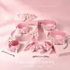 Set de moño rosa brillante de cuero para accesorios SM eróticos, esposas para entrenamiento de sirvienta, productos para adultos venta al por mayor de fábrica y entrega