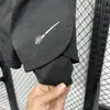 Shorts Esportivos Populares Fitness Respirável Secagem Rápida Masculino e Feminino Soltos para Corrida Shorts de Três Pontos Falso Duas Peças Anti-Exposição