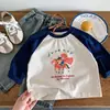 Camiseta de manga larga raglán de algodón puro estilo coreano para niños, nuevo modelo otoño 2026, camiseta básica para niños para primavera y otoño