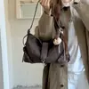 Bolso de hombro casual estilo coreano para mujer, nueva colección 2026, diseño único, gran capacidad, adecuado para otoño, bolso de axila elegante, bolso cruzado, bolso de mano