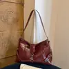 Outono 2026 Nova Cor Sólida Estilosa Moda Design de Nicho Simples para o Dia a Dia Bolsa de Axila Feminina Ombro Único Transversal
