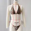 Biquíni sexy de três peças com estampa de leopardo, maiô de duas peças sem costas para mulheres, novo biquíni de comércio exterior 2026