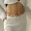Cadena para el cuerpo transfronteriza europea y americana más vendida, elegante cadena para el pecho de concha de perla sintética, cadena de cintura de playa única y moderna para mujer