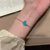 Fanjia versión superior collar pequeño de mariposa y nácar blanco, cadena para clavícula para mujer, chapado en oro de 18 quilates, pulsera de trébol de cuatro hojas de lujo ligero fábrica