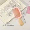 Peine infantil de alta calidad, estéticamente agradable, antiestático, de tamaño pequeño y dientes medios, en colores macarrón, adecuado para uso doméstico y portátil como peine de bolsillo.