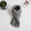 Bufanda de Punto Gruesa y Cálida Estilo Coreano de Invierno para Niños y Niñas, Protección para el Cuello Infantil, Bufanda para el Cuello de Color Sólido a Prueba de Viento con Etiqueta de Cuero Venta al por Mayor