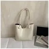 Bolsa de Mão Versátil Nova Moda Primavera 2026 Bolsa de Ombro Elegante Simples Cor Sólida Bolsa Tote de Grande Capacidade para Mulheres
